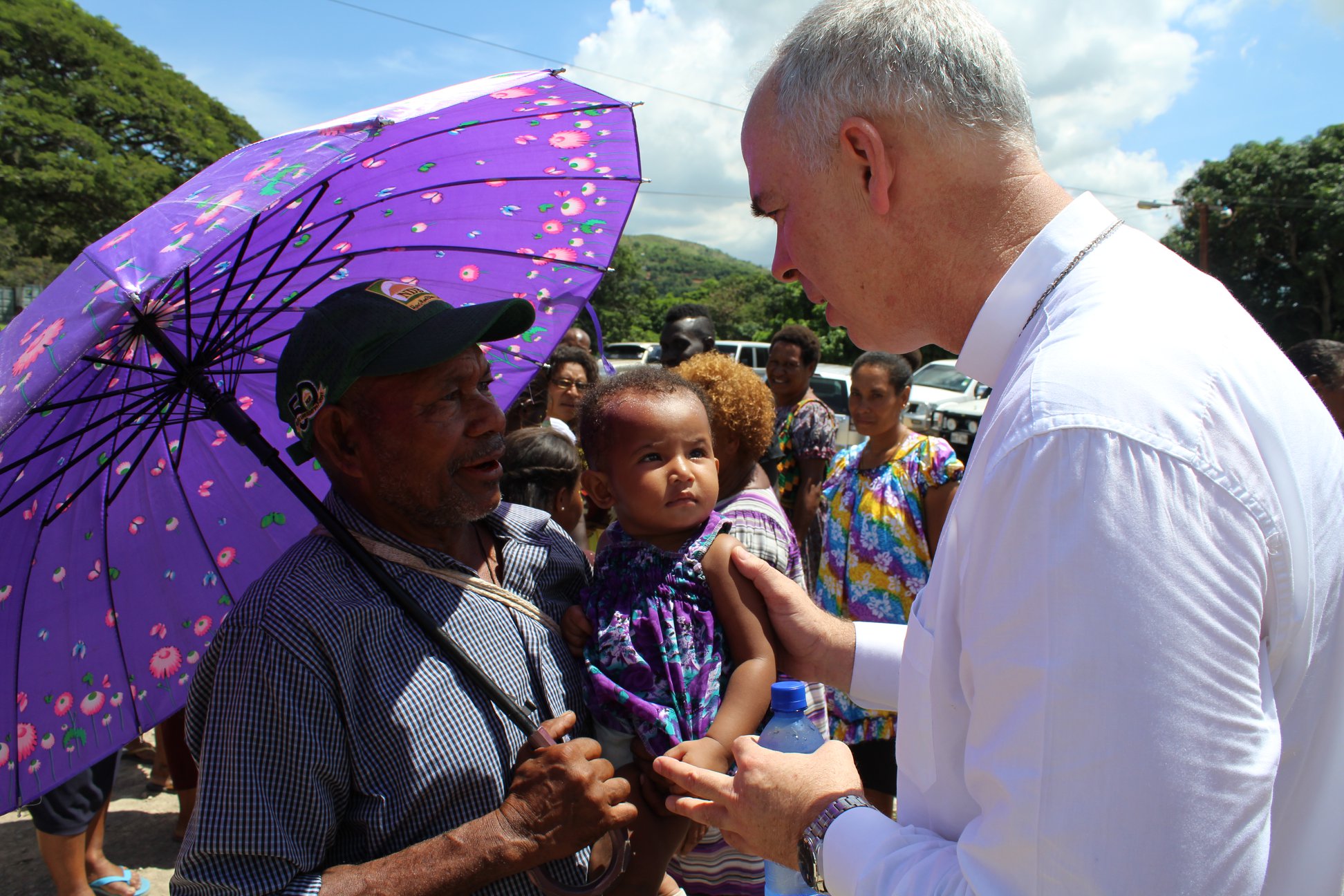 +Paul with locals in PNG 2